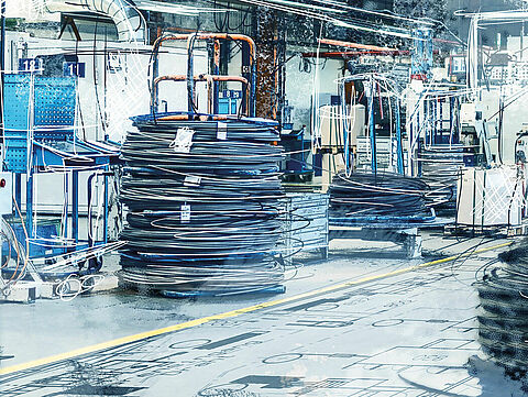 Cold forming machine in a production hall.